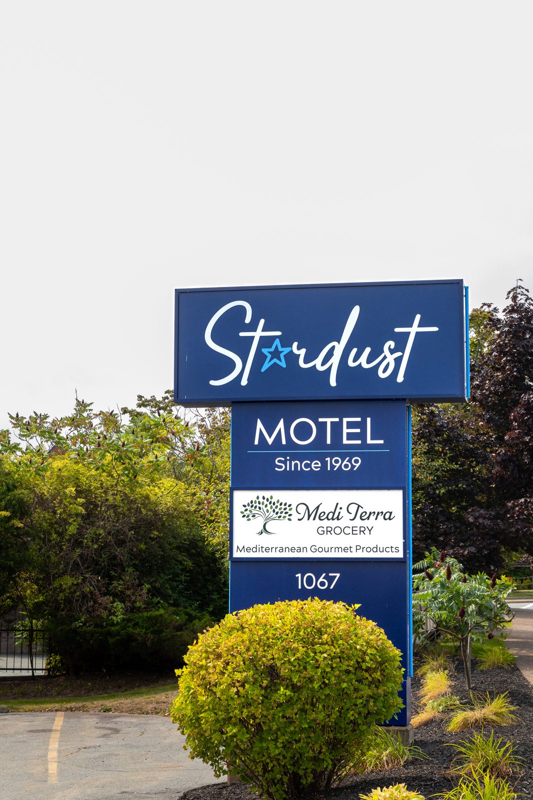 The Stardust Motel Bedford roadside sign