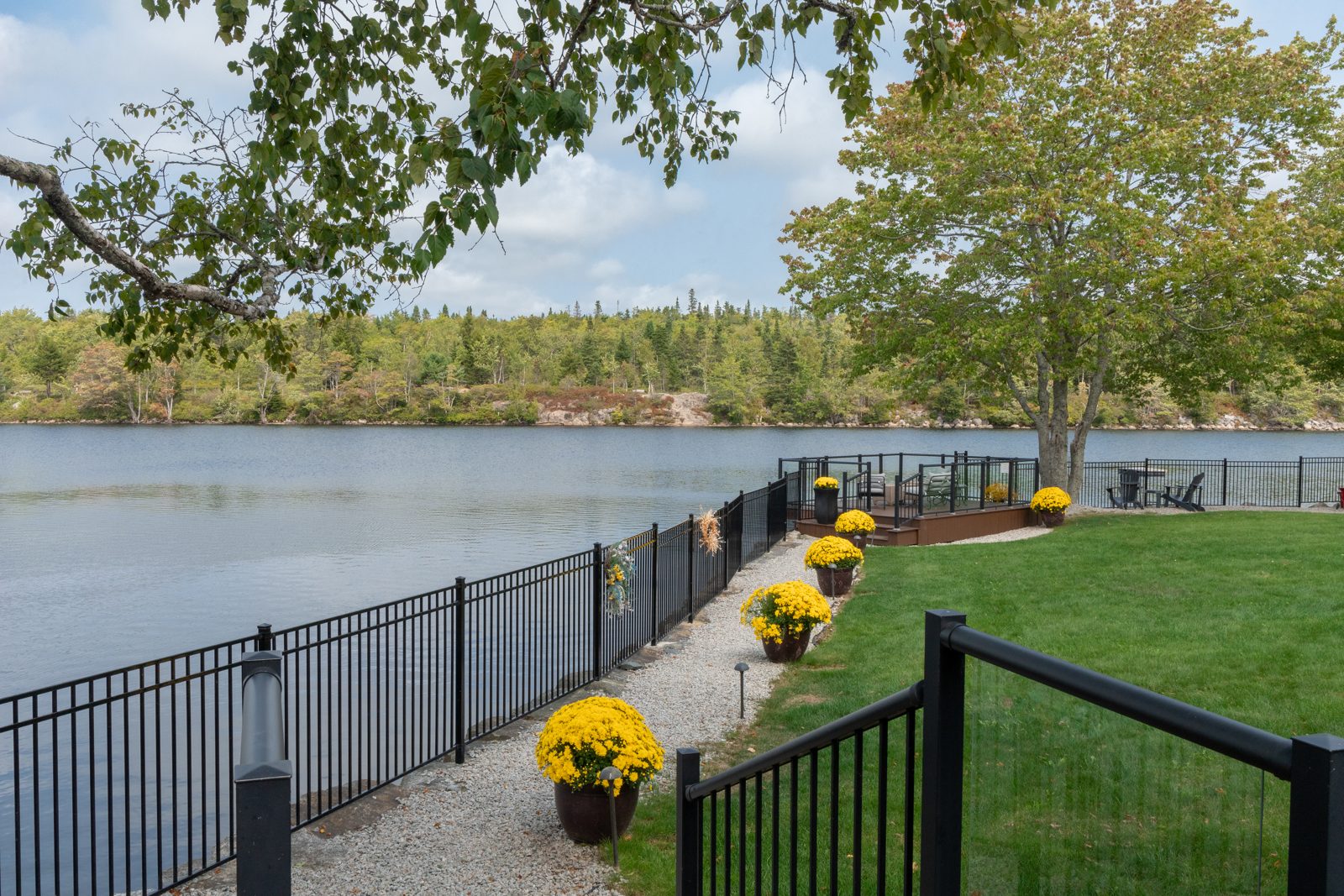 Fenced lakeside walkway at Timberlea